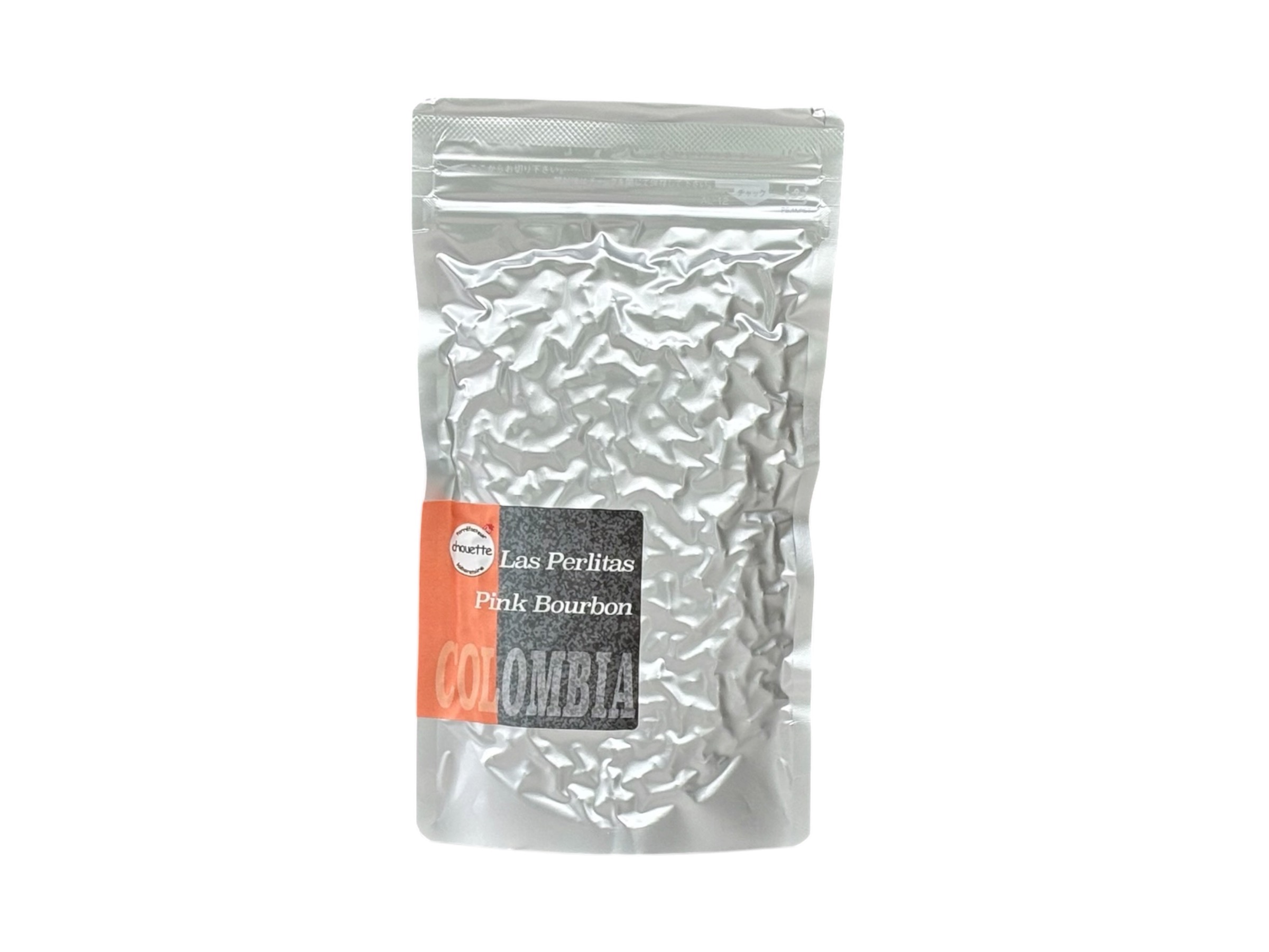 Photoroom_20260706_102947 | chouette torréfacteur laboratoire Silver foil coffee bag with a red-orange label reading 'Las Perlitas Pink Bourbon Colombia' on the front.